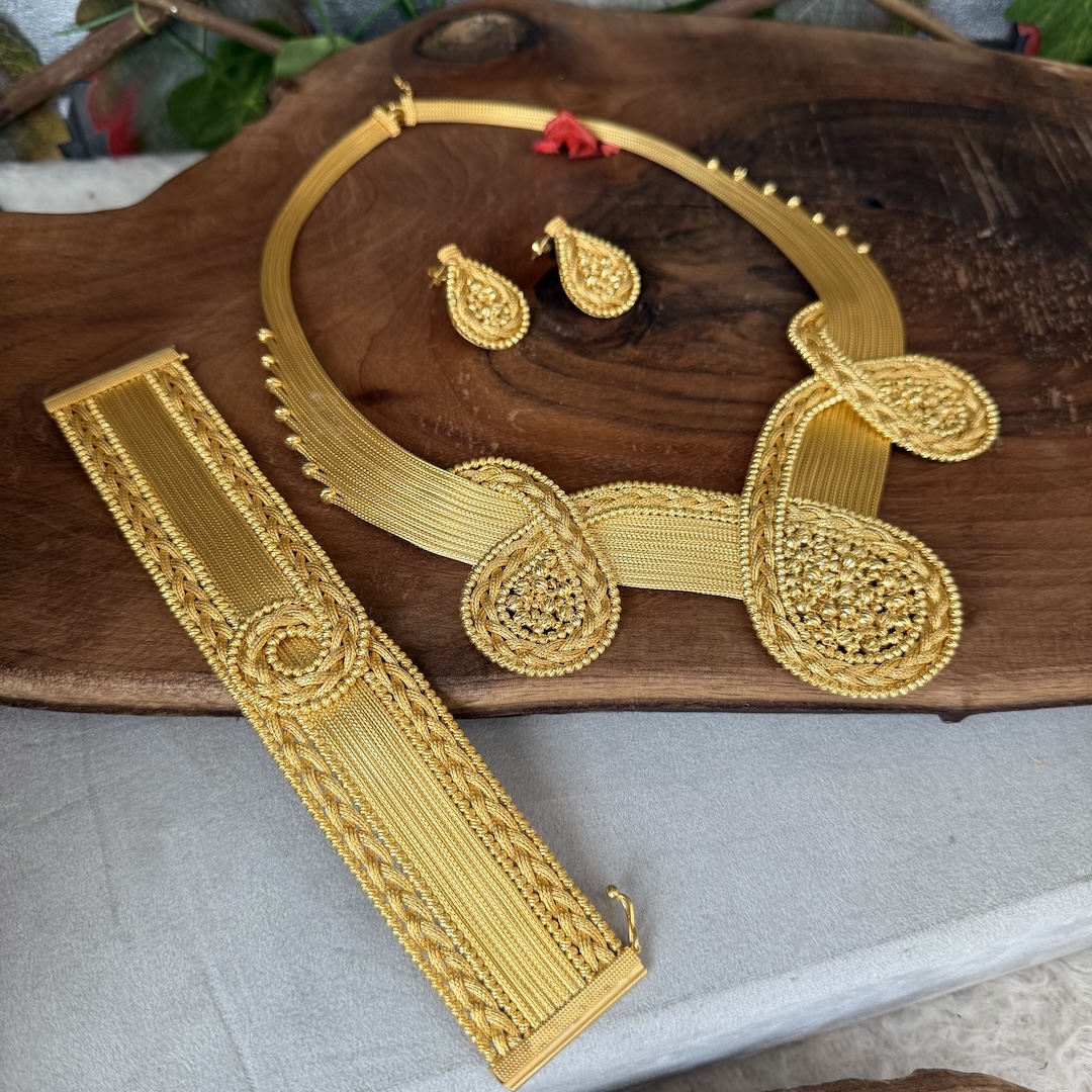 dorika-islemeli-damla-modeli-bayan-taki-seti