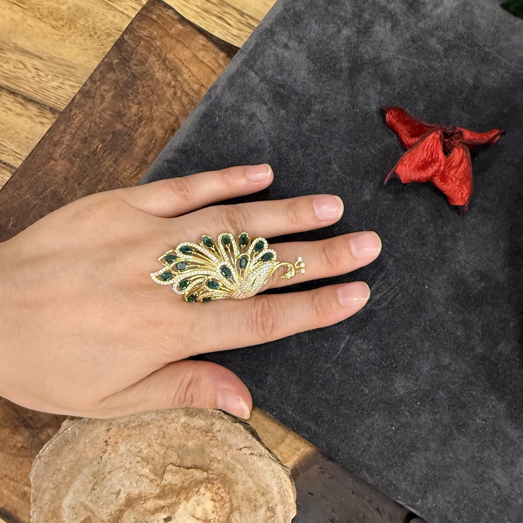 yesil-tasli-altin-modeli-gumus-yuzuk