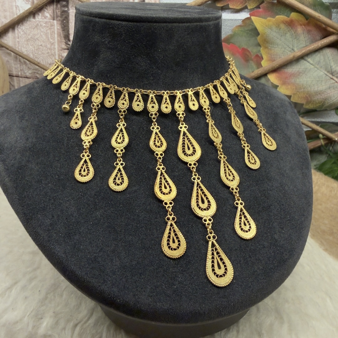 Artuklu-modeli-telkari-islemeli-gumus-bayan-kolyesi